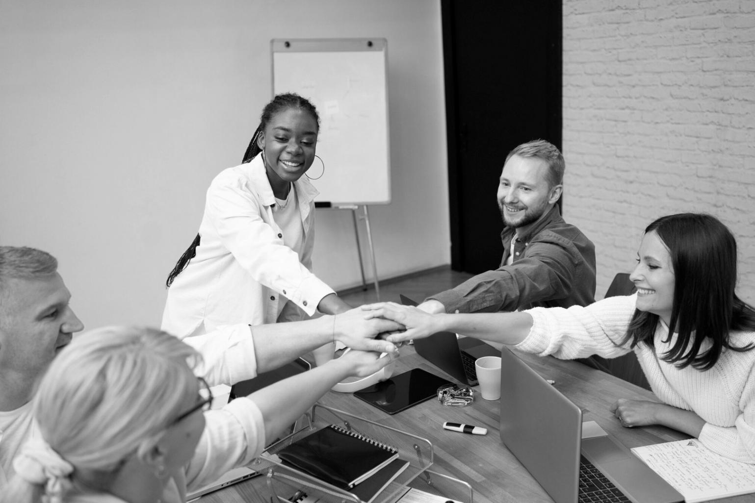 Financial analysis workspace showing charts and documents in natural office setting