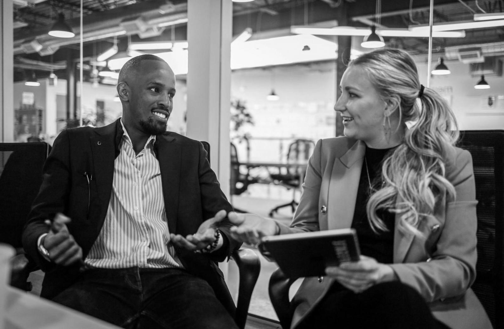 Early workshop session with participants learning financial analysis basics in community setting