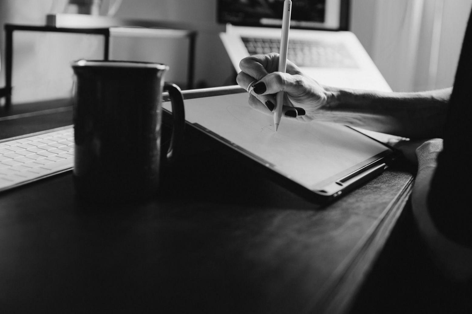 Professional workspace with financial documents and analysis tools